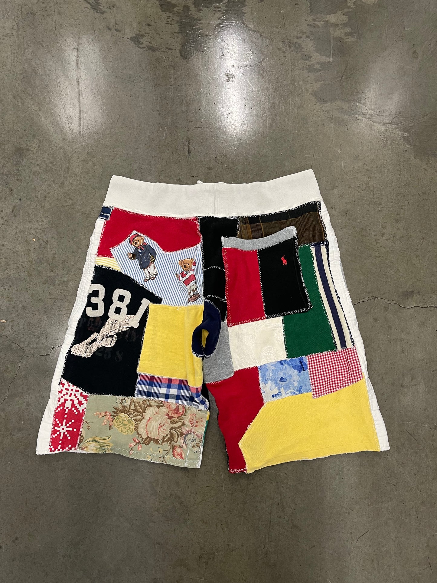 BLUESIN’S “PRL JUMBLE” POLO RALPH LAUREN PATCHWORK SWEAT SHORTS