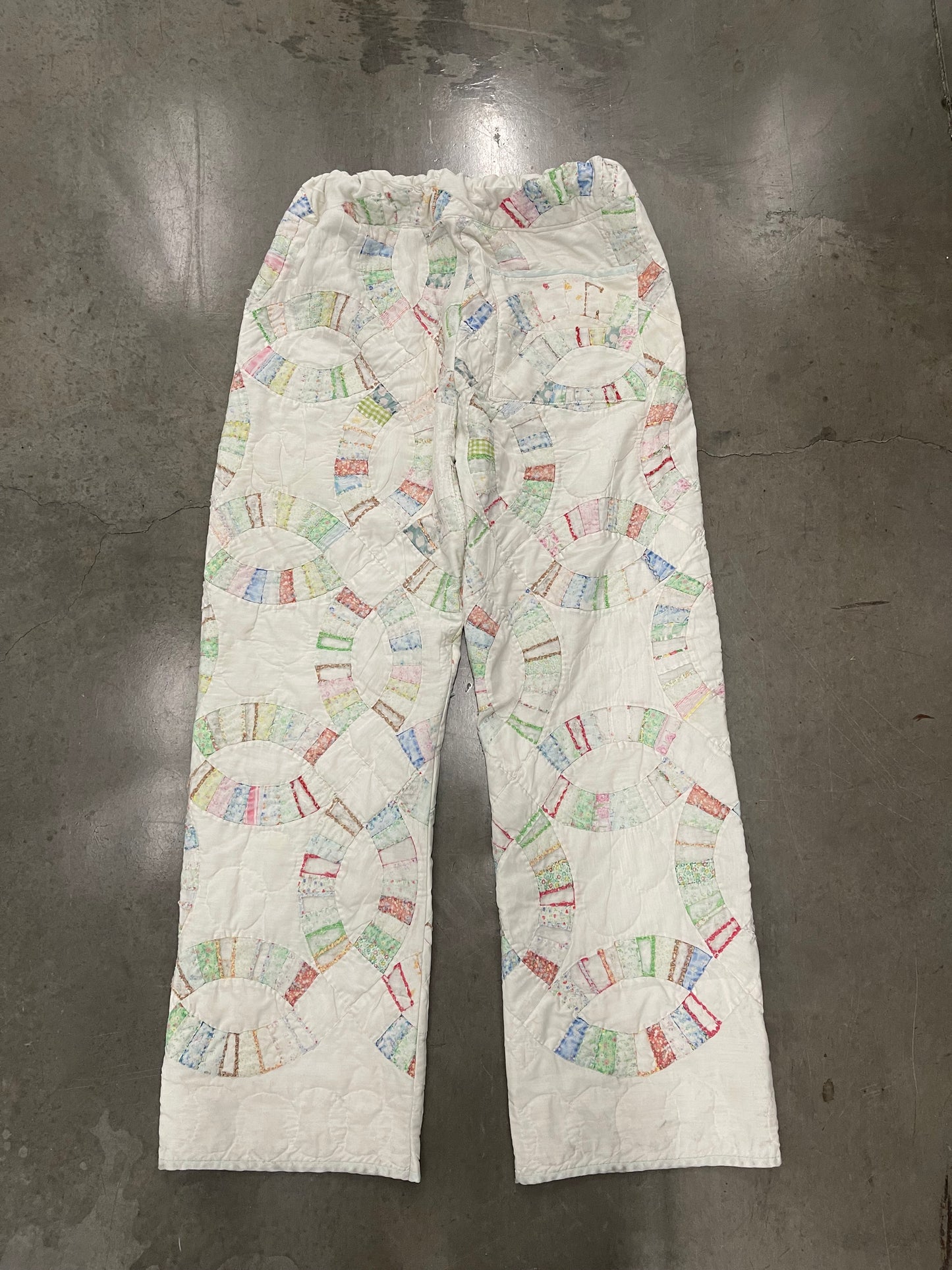 BLUESIN’S “INTERLOCKED HARMONIES” TATTERED WEDDING RING QUILTED VINTAGE PANTS