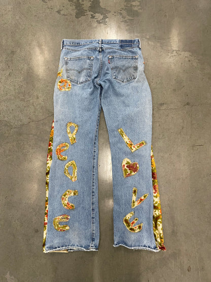 Bluesin’s “Seeds For Peace” Flared Floral Patchwork Denim Jeans