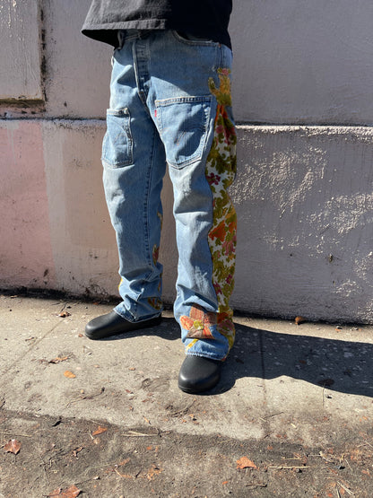 Bluesin’s “Seeds For Peace” Flared Floral Patchwork Denim Jeans