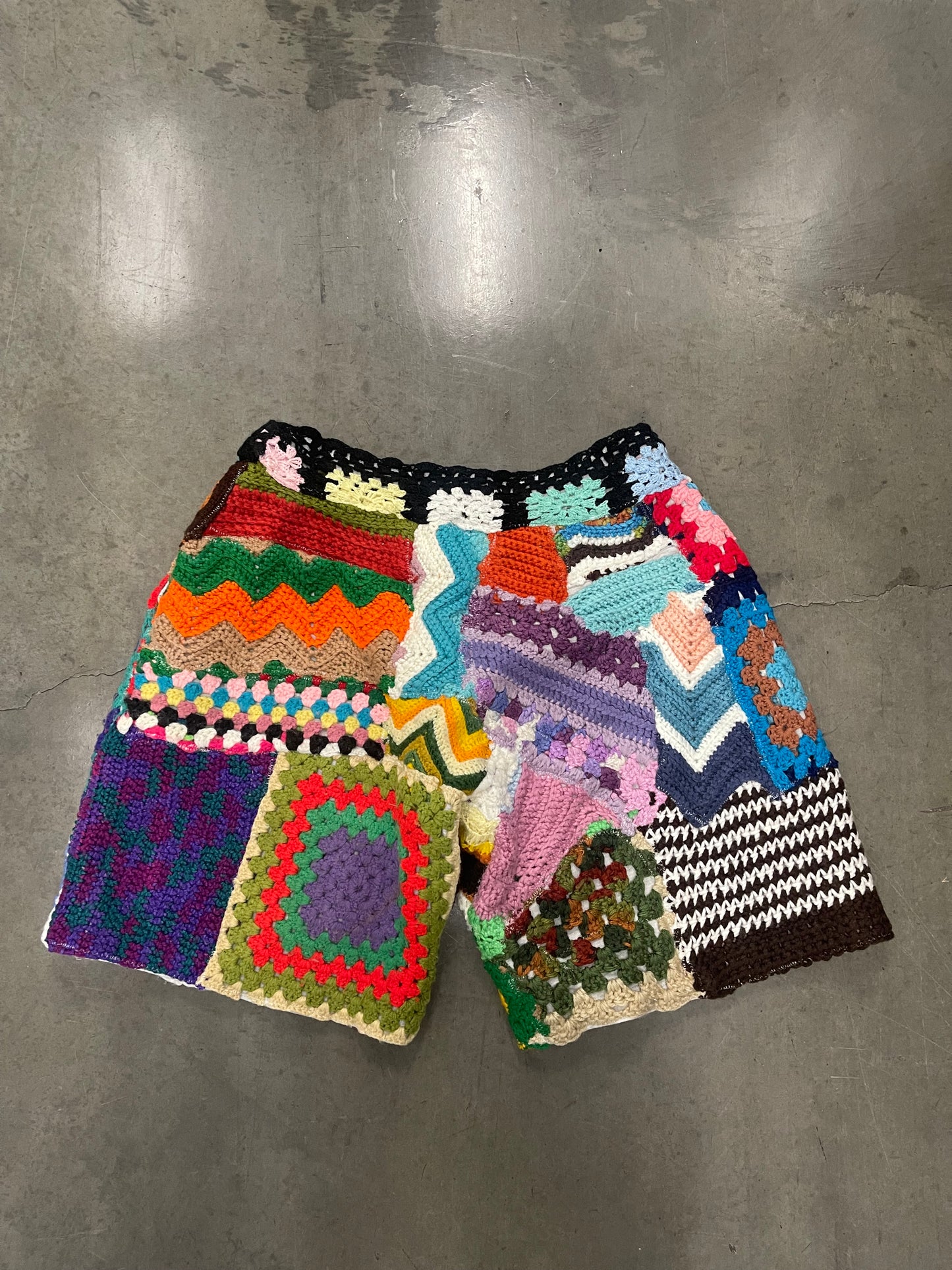 BLUESIN’S “ELABORATE COMPOSITIONS” PATCHWORK CROCHET SWEAT SHORTS