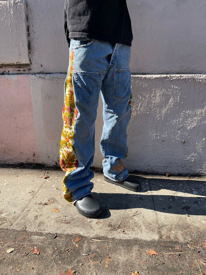 Bluesin’s “Seeds For Peace” Flared Floral Patchwork Denim Jeans