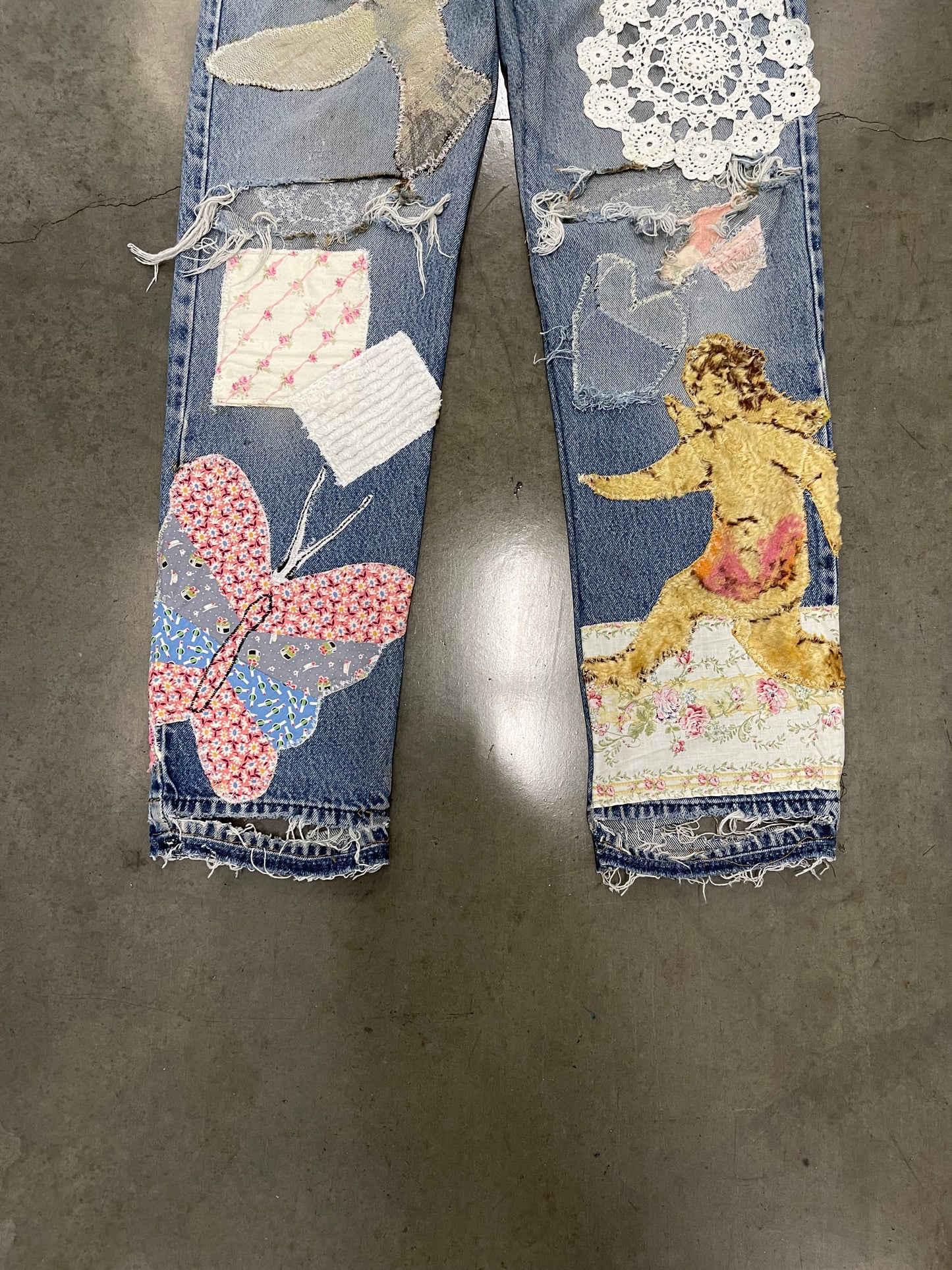 Bluesin’s “Peace Love & Healing” Patchwork Reworked Denim Jeans