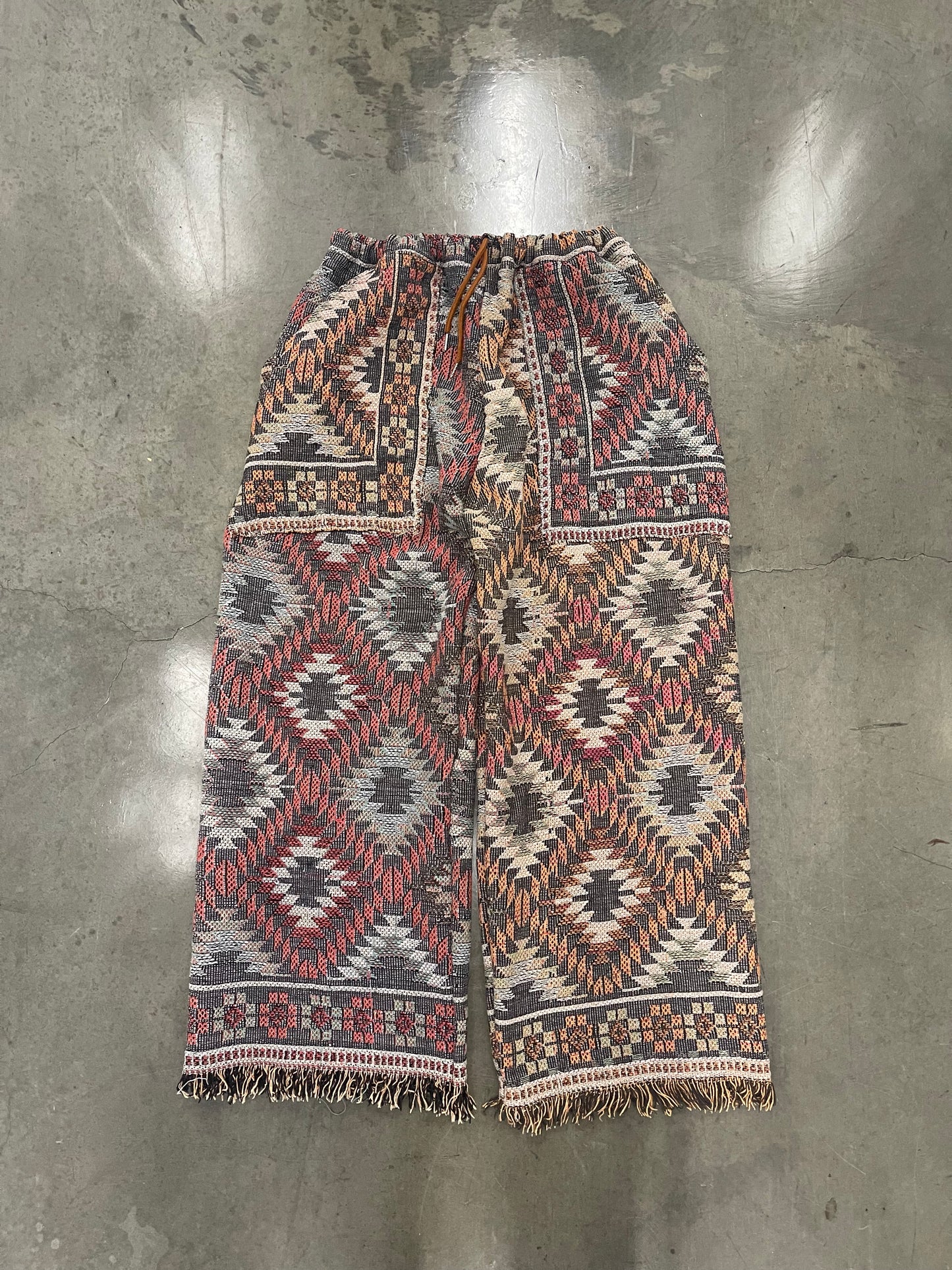 BLUESIN’S “SOUND PATTERNS” SOUUTHWESTERN GEOMETRIC TAPESTRY PANTS