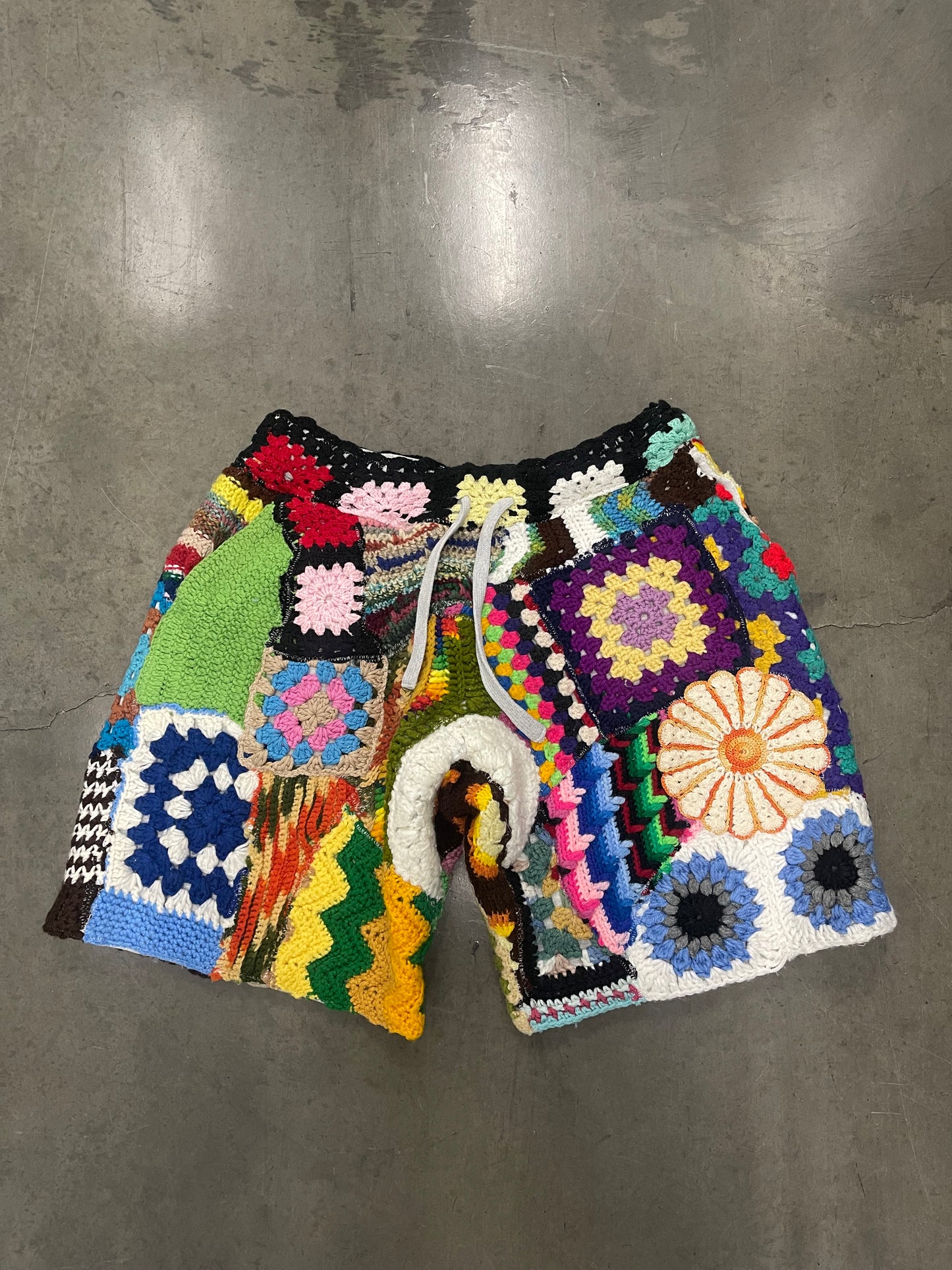 BLUESIN’S “ELABORATE COMPOSITIONS” PATCHWORK CROCHET SWEAT SHORTS