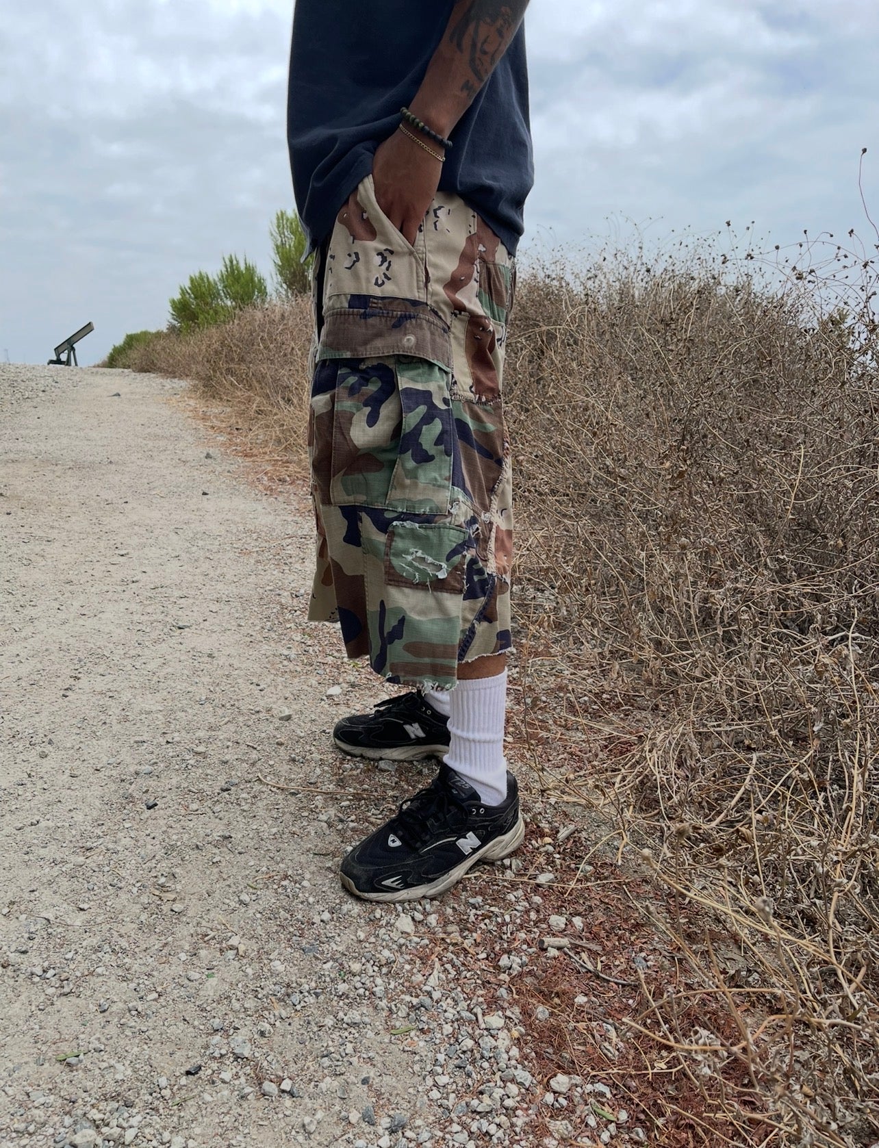 BLUESIN’S “BLENDED SURROUNDINGS” PATCHWORK CAMOUFLAGE CARGO SHORTS