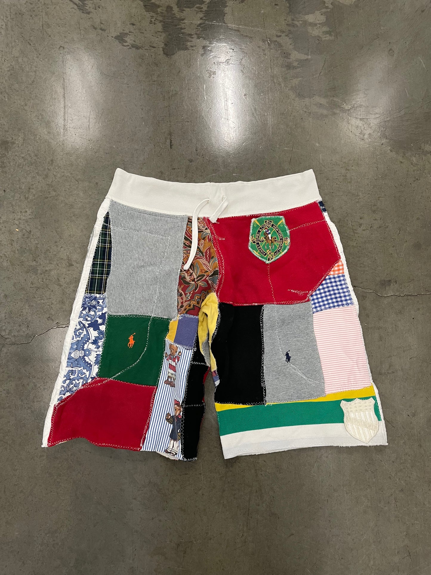 BLUESIN’S “PRL JUMBLE” POLO RALPH LAUREN PATCHWORK SWEAT SHORTS