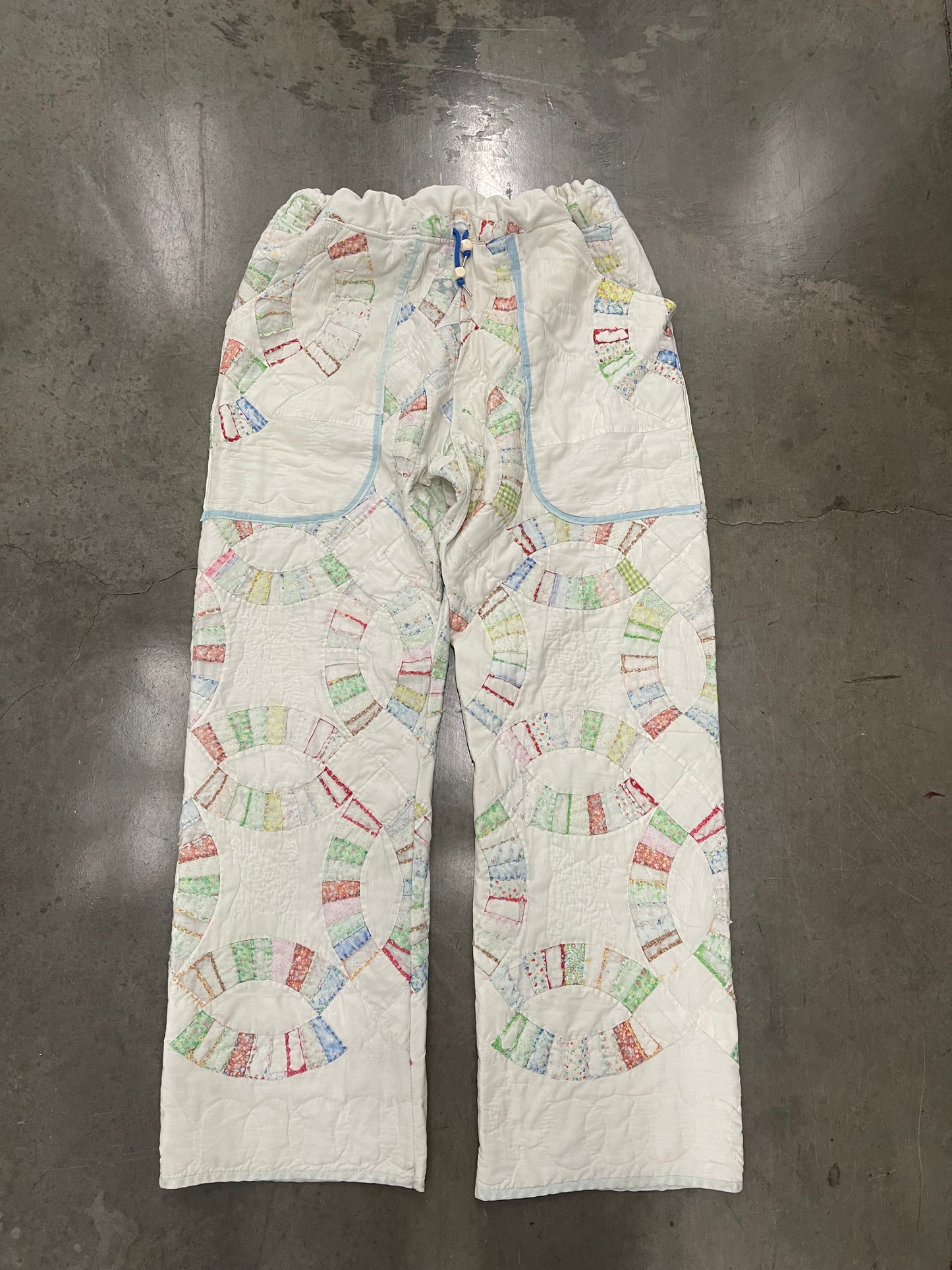 BLUESIN’S “INTERLOCKED HARMONIES” TATTERED WEDDING RING QUILTED VINTAGE PANTS