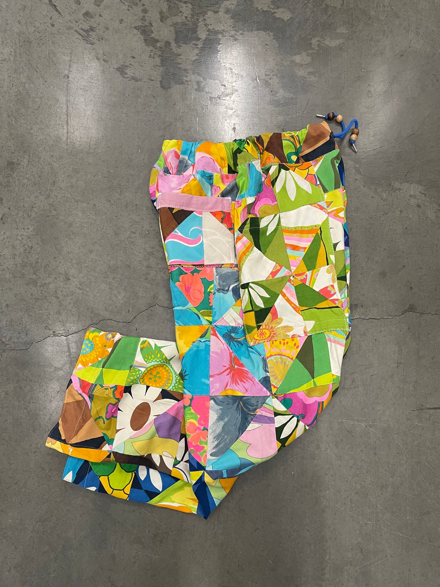 BLUESIN’S “TROPIC AWAITS” VINTAGE HAWAIIAN TIKI PATCHWORK PANTS