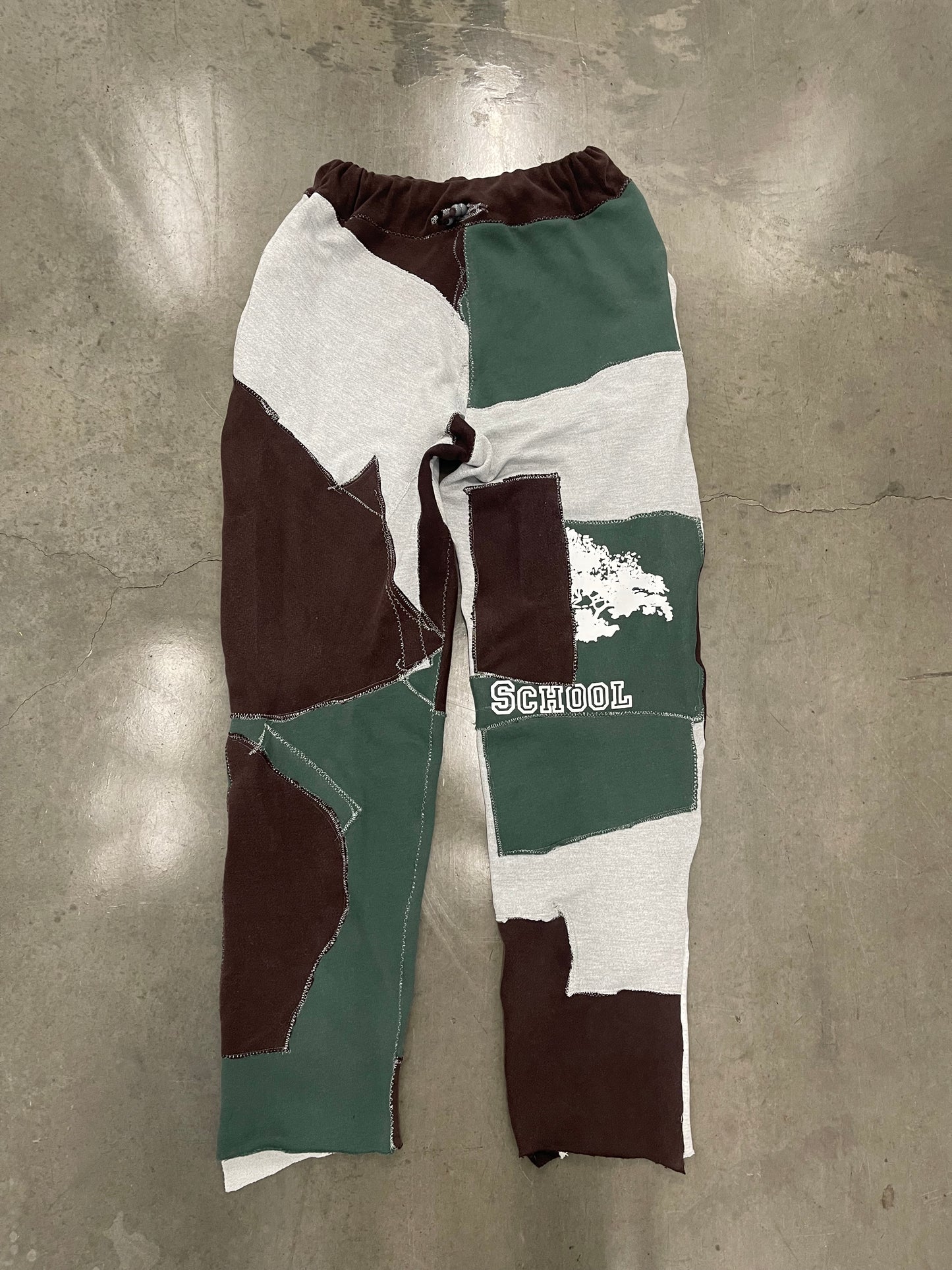BLUESIN’S “SCHOOL” PATCHWORK SWEATPANTS